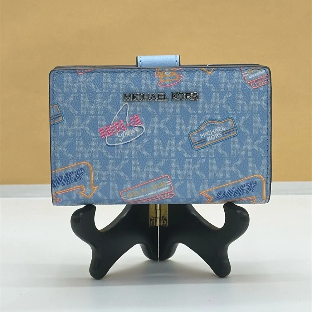 Michael Kors Jet Set Travel Medium Printed Signature Logo Bi-Fold Wallet LT SKY